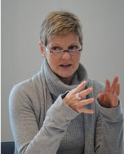 Dr. Helle Becker