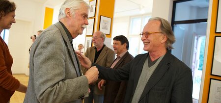 F.W. Bernstein begrüßt Zeichner-Kollegen Erich Rauschenbach