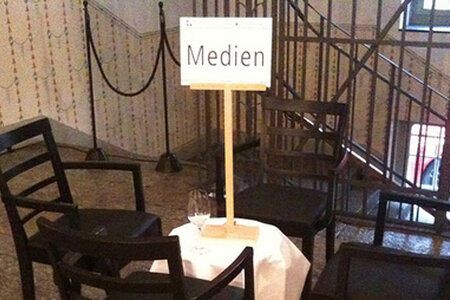 Medien an einen Tisch