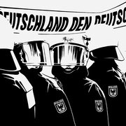 Polizisten vor einem Transparent mit der Aufschrift "Deutschland den Deutschen"