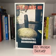 Im Hintergrund eine Reihe Bücher. Im Vordergrund die Ausgabe "Kriminalfall Brandenburg" der Zeitschrift "Die Mark Brandenburg".