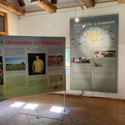 Ein Blick in das BUND-Besucherzentrum in der Burg Lenzen. Dort ist die Ausstellung "Stadt, Land, Klima. Klimawandel und Nachhaltigkeit in Brandenburg" zu sehen. 