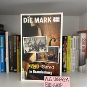 Im Hintergrund eine Reihe Bücher. Im Vordergrund das Heft "Die Mark Brandenburg. Punk = Barock in Brandenburg".