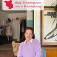 Tina Vogel sitzt auf einem Sessel. 